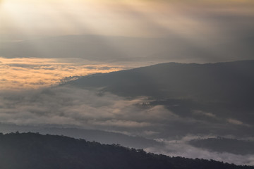 sunrise with fog on mountain