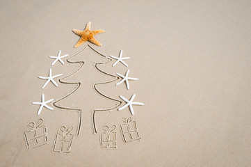 Simple eco-friendly Christmas tree decorated with starfish tree topper and cute presents drawn on...