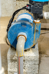 closeup of high pressure water motor in blue color 
