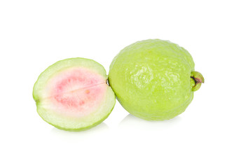 whole and half cut fresh ripe pink guava on white background