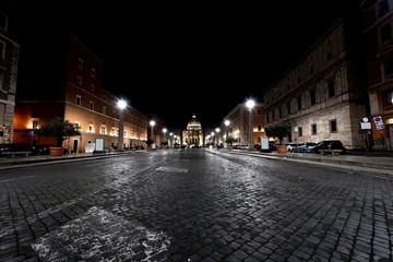 Fototapeta na wymiar way of conciliation and in the background San Pietro, Rome by night