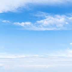 Blue sky with layers of clouds