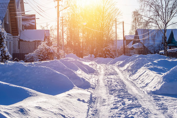 Russian winter village, snow, sun, the central part of Russia.