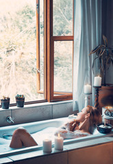 Woman with pleasure taking bath