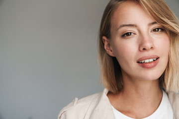 Close up of a lovely young blonde short haired woman