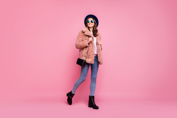 Full length photo of amazing millennial lady going down street watching sightseeing wear stylish...