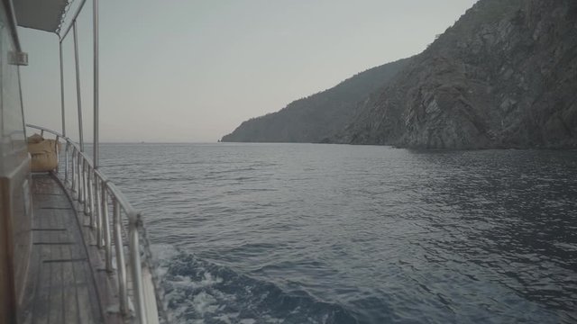  Panoramic view of an island cliff from boat in the sea, s-log ungraded