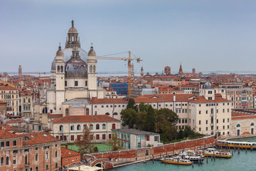 Fototapeta na wymiar Aerial view of Basilica della Salute from Giudecca channel, Venice, Italy