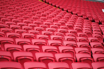 Fototapeta premium sport stadium chair. empty red concert chair. plastic red seats