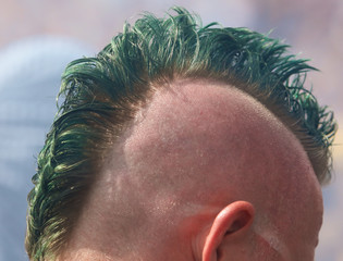 Iroquois hairstyle on a man’s head