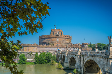 Sant'Angelo Castle framed by the tree in Rome, Italy