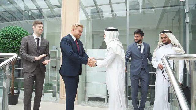 Successfully made deal between sheikh and caucasian businessman. Business, money deal