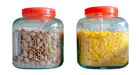 There are 2 dozen glass jars containing cornflakes.