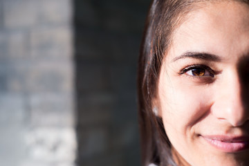 Obraz premium Portrait of a beautiful young multiethnic, smiling. Close-up