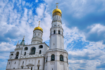 Bell tower of Ivan the Great of the Moscow Kremlin. Church bell tower in the architectural ensemble of the Cathedral square - Kremlin, Moscow, Russia in June 2019