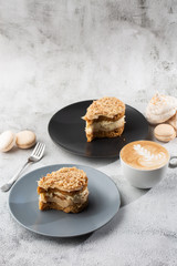 Banana or nut cake on gray plate on marble background. Selective focus. Vertical photo. Menu for bakery. cafe menu. Pastry. Delicious and sweet dessert at cafe restaurant.