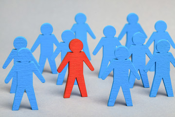 Team Leader. HR. The right choice of staff. Blue men and red leader