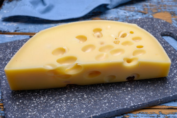 Cheese collection, french hard cheese with holes emmentaler