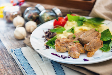 potato puree, pork cuff filet and cepes sauce