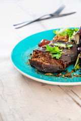 fondant beef paleron and its juice at the winemaker