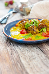 6 vegetable balls and quinoa , curry coconut cream