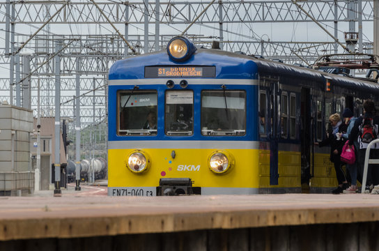 GDYNIA, POMERANIA REGION / POLAND - 2019: Passenger train at the platform of the railway station