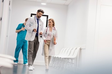 Doctors discussing medical result of patient in clinic