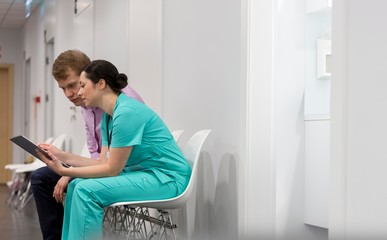 Nurse discussing patient's medical result in clinic