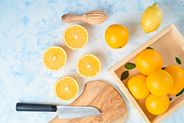 top view of the process of making fresh orange juice, flat lay