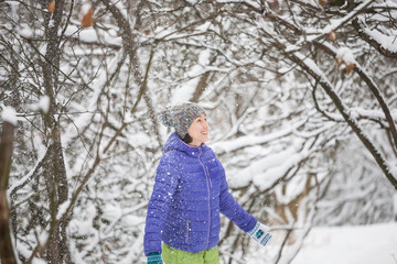 Portrait of a woman in a knitted hat.