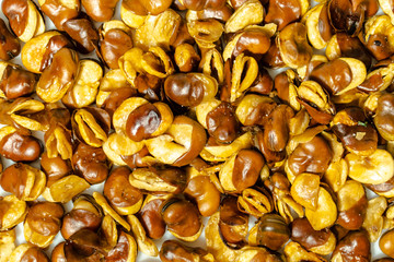 Pile fried board beans snack full frame background