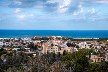 Fototapeta na wymiar High point view to the Paphos city with buildings, sea and sky.