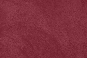 Fototapeta premium Dark red low contrast concrete textured wall background to your concept or product. Winter color trend.