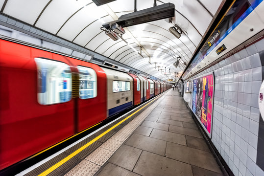 London, UK - June 26, 2018: Underground Tube Metro With Motion Moving Red Subway Train In Pimlico District Area, Nobody On Platform Station