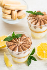 Lemon tiramisu dessert with cocoa and mint