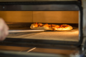 Fabrication artisanale pizza, Pizza