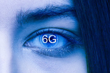 Close up shot of female eye 6G mobile technology concept - high internet speed