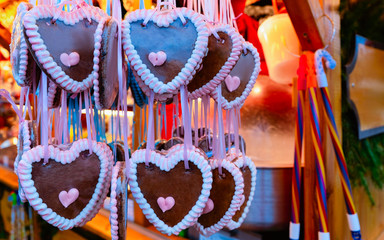 Heart shape Gingerbread cookies in Christmas market of Germany Europe in winter. German Night...