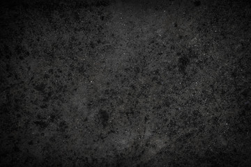 Black concrete wall texture background. Polished concrete floor grunge surface.