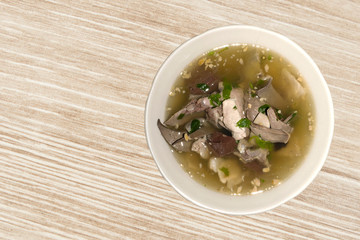 Soup with pork offal, street food in thailand.