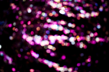 Glitter lights abstract background. Disfocused bokeh