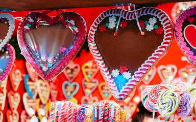 Gingerbread hearts cookies at Christmas Market at Charlottenburg Palace in Winter Berlin, Germany. Advent Fair Decoration and Stalls with Crafts Items on the Bazaar.