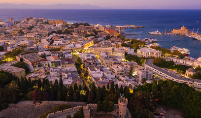 Aerial drone photo of Palace of the Grand Master in Rhodes, Greece. sunset view of the fortress and port