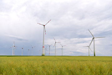 renewable energies - power generation with wind turbines in a wind farm