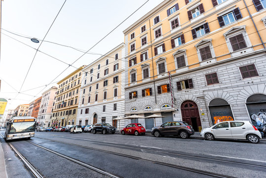 Rome, Italy - September 5, 2018: Italian street outside in historic city in morning, trolley bus wide angle road, nobody, cables, in Monti neighborhood