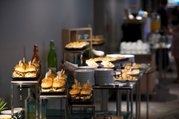 Fototapeta na wymiar Snack set of people group catering buffet food indoor in luxury, Inside the hotel.
