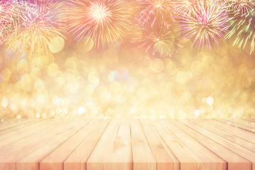 wood floor with beautiful fireworks and bokeh glitter background for template