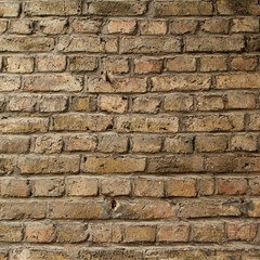 texture of an old light brick stone wall, background