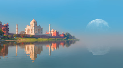 Taj Mahal with full moon at sunset - Agra, India 