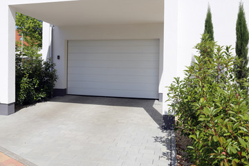 Modern white garage door (sectional door)